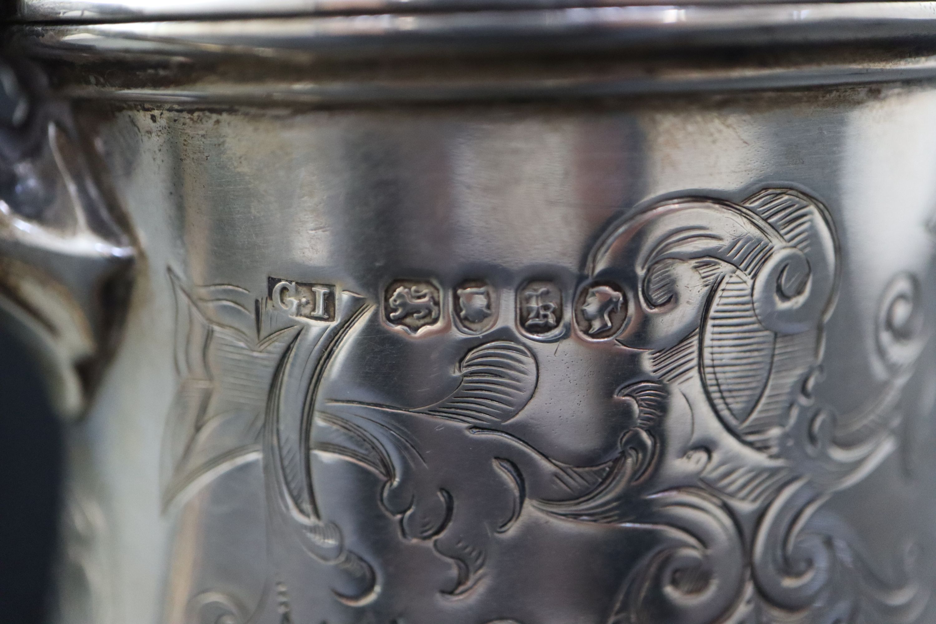 A Victorian small engraved silver hot water pot, 5.7cm, gross 10.5oz.